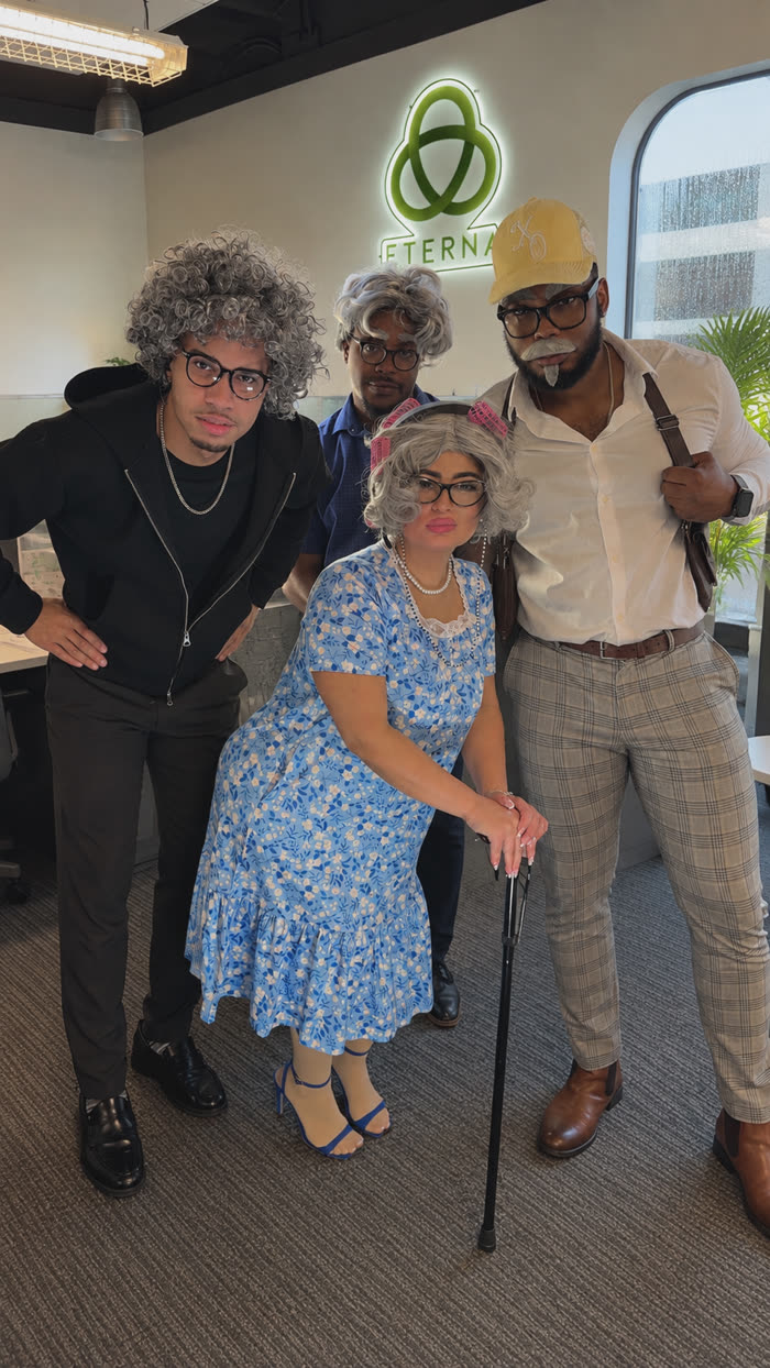 Royal Legacy agents dressed as grandparents for a themed day at the Eterna office